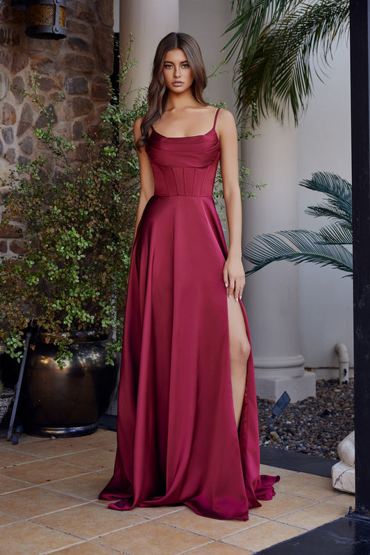 Elevate your formal moment in this stunning Nox Anabel A1744 satin gown. Featuring a sculpted corset bodice that flatters and supports, a graceful train for dramatic impact, and a scoop neckline that balances elegance with allure. The strategic slit adds modern sophistication to this pageant-ready design. Perfect for prom, pageants, or any black-tie occasion where you want to make an unforgettable entrance. Crafted from luxurious satin for a refined, polished finish.
Sizes: 00-16
Colors: Black, Burgundy,