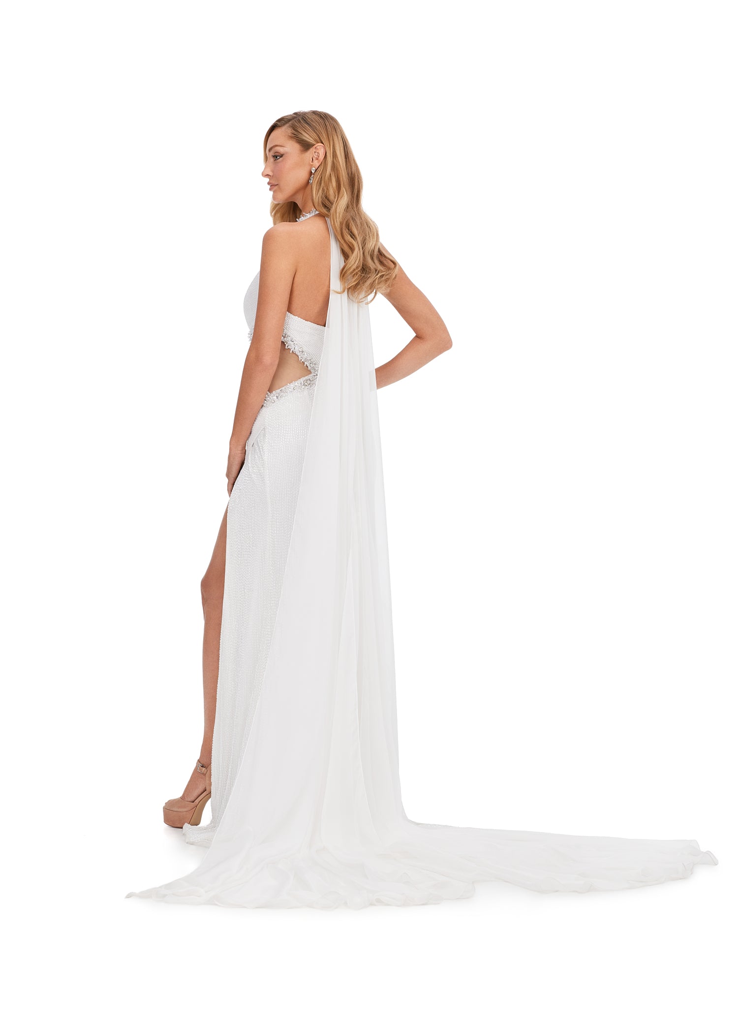 Ashley Lauren 11399 Halter Neckline Liquid Beaded Chiffon Cape Illusion Cut Outs With Crystal Detail Formal Dress . Sparkle from every angle in this elegantly detailed gown. The liquid beading is met with crystal accents that follow the dresses cut outs. With a gorgeous flowing cape, this dress is going to make you feel and look glamorous!