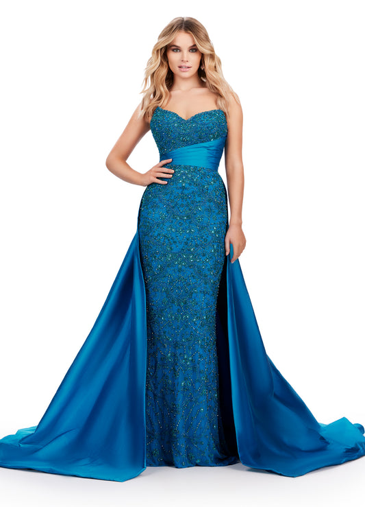 Elevate your formal attire with the Ashley Lauren 11571 long prom dress. Adorned with intricate beadwork and a taffeta belt, this gown exudes elegance and sophistication. The overskirt adds a touch of glamour to the look. Perfect for prom, pageants, or any special occasion. This strapless ball gown features a velvet bustier accented with crystal detailing at the waist. Feathers accent the scattered beading on the organza tiered ruffle skirt.