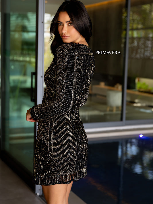 Primavera Couture 12076 2-Piece Long Sleeve Beaded Embellished Top Fully Sequin Shorts Jumpsuit. Add a bold look to your wardrobe with Primavera Couture's 12076 jumpsuit. This 2-piece suit features a long sleeve beaded top with fully sequined shorts, providing a stunning combination of elegance and shine. Perfect for a formal occasion. Beaded Romper Jacket Formal Jumpsuit