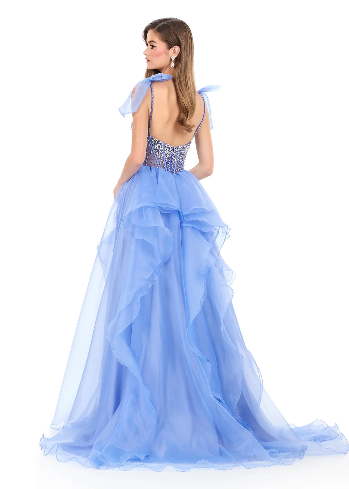 Ashley Lauren Style 12312 is a long prom dress designed for pageant and formal evening events. This elegant gown features Ashley Lauren's signature attention to fit and detail, creating a flattering silhouette that stands out on stage and in photos. Be romantic and whimsical in this soft tiered organza skirt and delicately beaded bodice. The adjustable ribbon-tie straps on ASHLEYlauren Style 12312