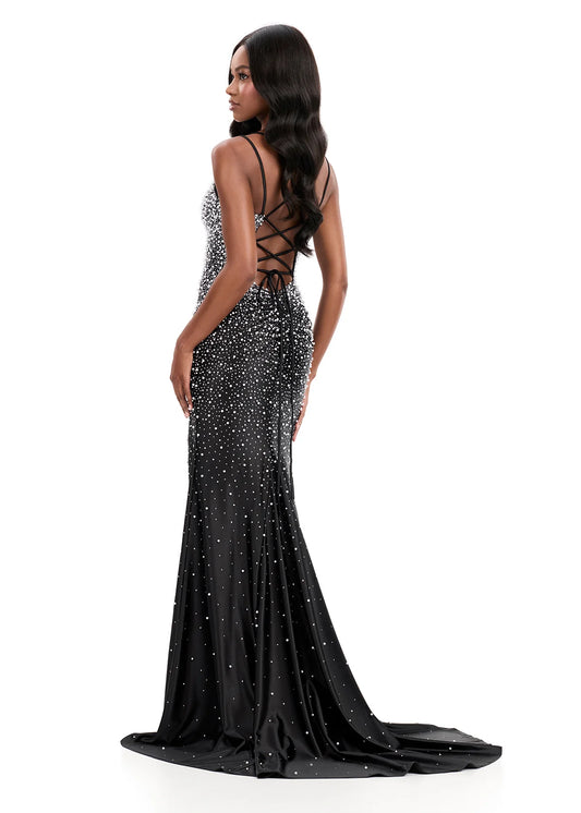 Ashley Lauren 12357 Make an entrance in ASHLEYlauren Style 12357 pearl crystal prom dress. This gown features full pearl beading, a fitted silhouette, lace up back and sleek sweetheart neckline. The vertical beadwork accentuates the waist and elongates the figure.