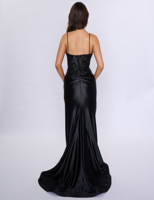 Look stunning at prom or any formal event with the Nina Canacci 1585 Fitted Sequin Long Prom Dress. This figure-hugging gown features a flattering ruched V-neckline and a daring thigh-high slit. The sequin fabric adds a touch of glamour and the long length will make you stand out.
Sizes: 0-14
Colors: Black, Emerald, Rose Gold