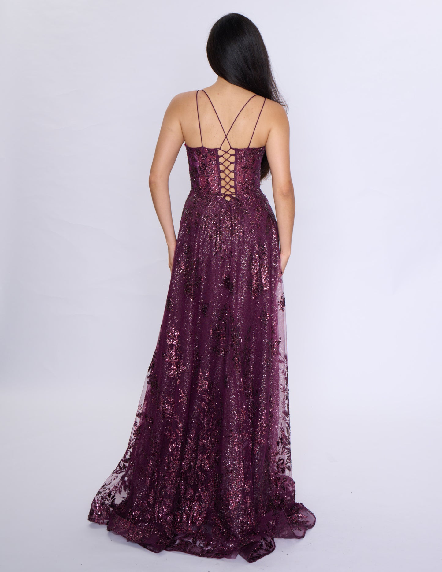 Shine at your prom with the Nina Canacci 1589 Sheer Sequin A Line Prom Dress. Featuring a corset bodice and a V-neckline, this formal evening gown will accentuate your figure. The sheer sequin fabric adds a touch of glamour to your look. Make a statement with this elegant and on-trend dress.
Sizes: 0-18
Colors: Sage, Rose Gold, Mulberry, Navy/Lilac