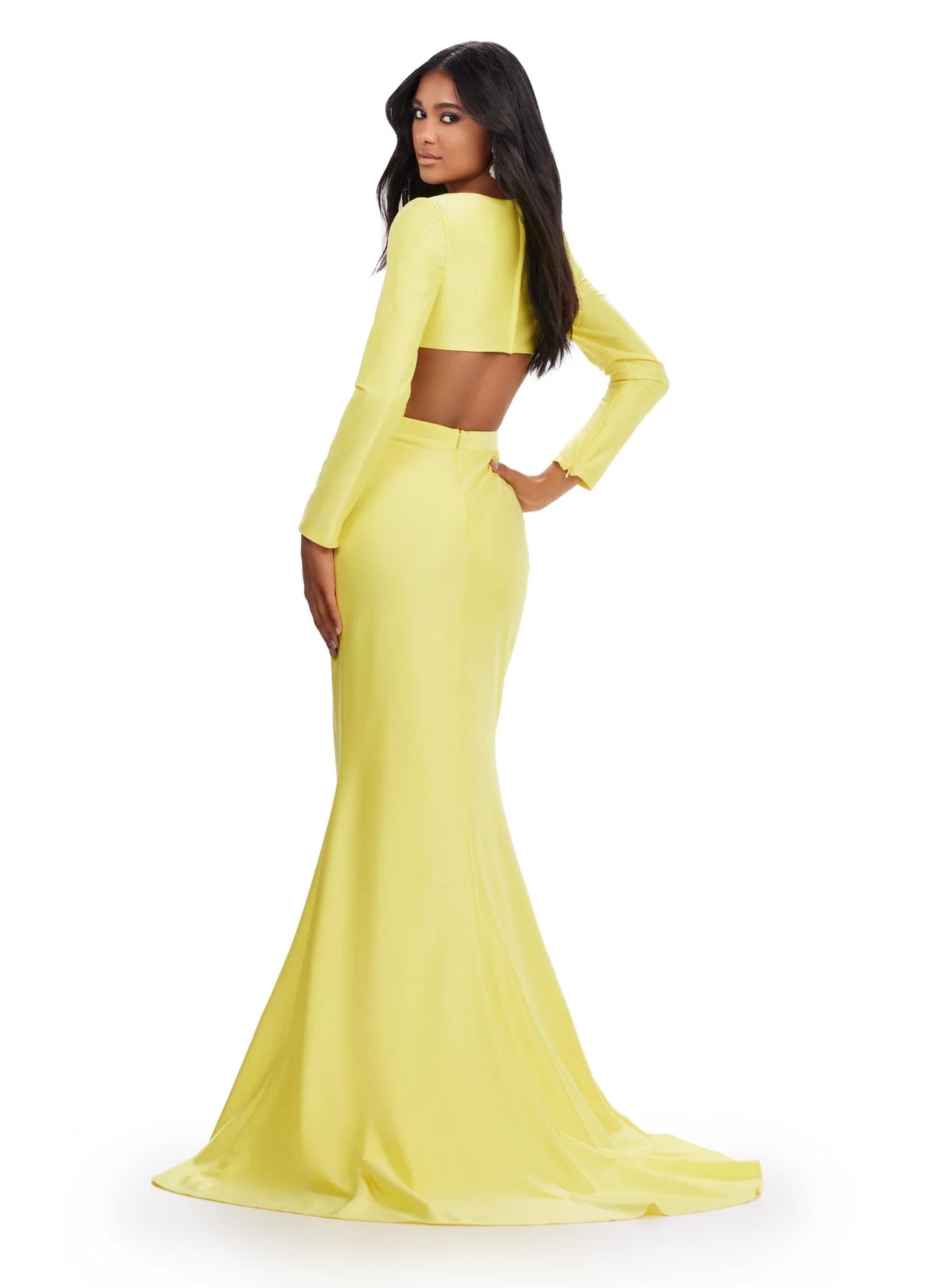 Look fabulous on prom night in the Ashley Lauren 11607 Jersey Cutout Dress. Cut from stretch jersey, this formal gown features a fitted skirt with a high side slit, long sleeves, and a scoop neckline with cutout detail. Make an unforgettable entrance in this figure-flattering style. Be unique in this v-neckline gown with crisscross cut out bodice. The look is accented with a fitted draped skirt and long sleeves. COLORS: Yellow, Turquoise, Hot Pink, Coral