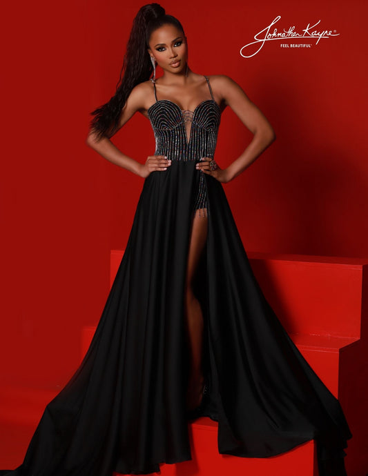 Johnathan Kayne 2748 Plunging fringe sequin v neck sequin maxi slit long dress Take a daring new step in the Johnathan Kayne 2748 dress. Matching sequin elements add sparkle to the plunging V-neckline, fringe detailing and long side slit that make this maxi an unforgettable statement piece. Reach out and captivate the world with this daring style! Sizes: 00,0,2,4,6,8,10,12,14,16 Colors: Black/Multi