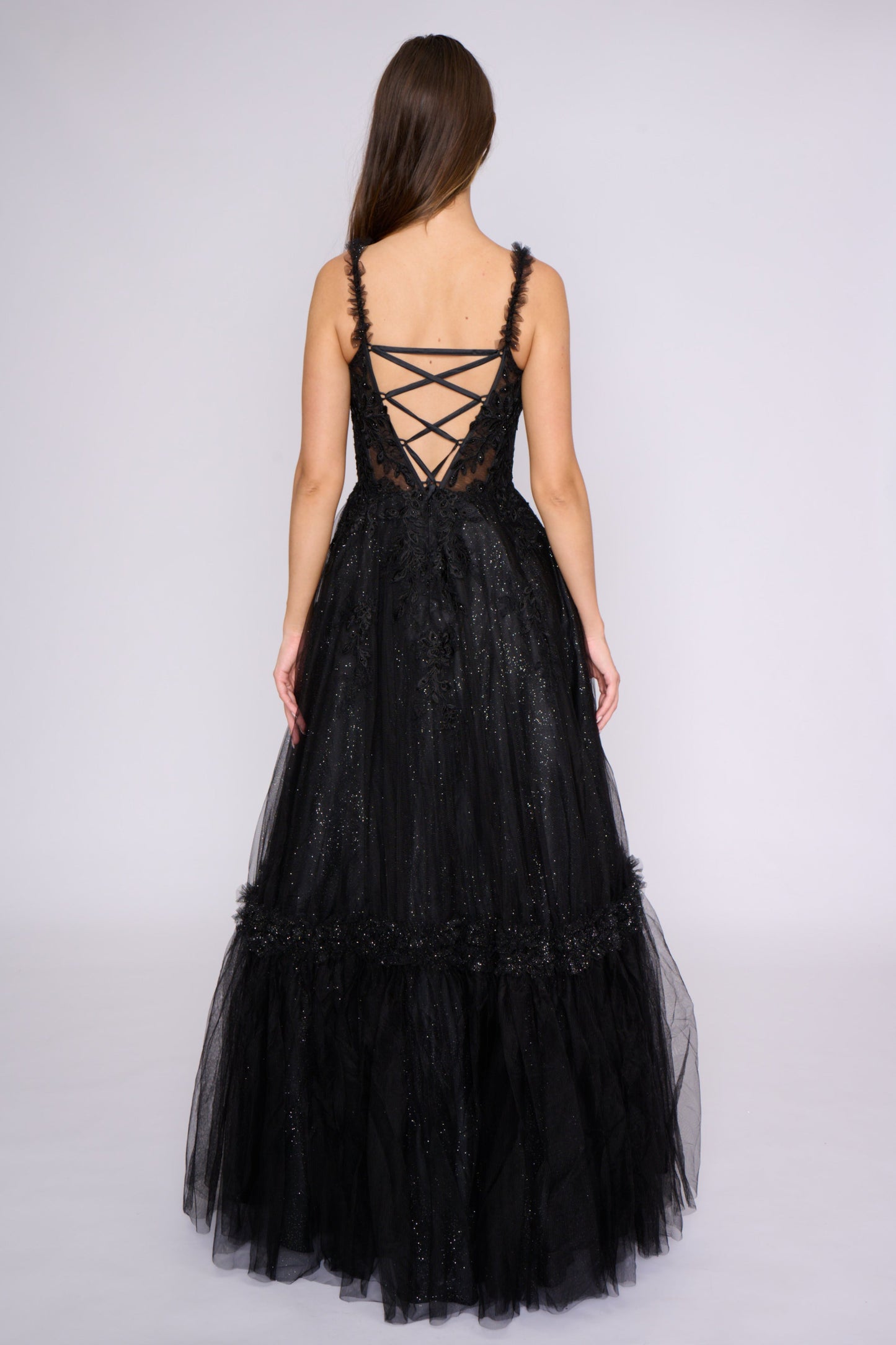 This Nina Canacci 3272 prom dress features a shimmering lace corset and pleated A-line ballgown silhouette, creating a stunning and sophisticated look. The backless design adds a touch of allure, while the structured corset provides a flattering fit. Perfect for any formal occasion.
Sizes: 4, 8
Colors: Black