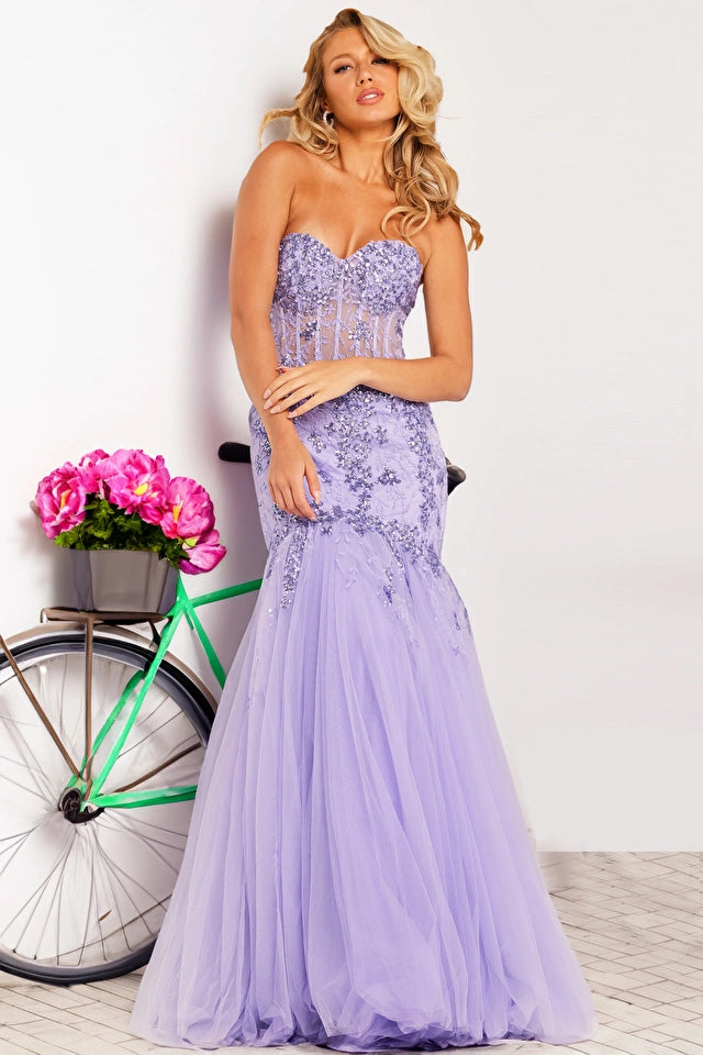 The Jovani 37249 is a dazzling formal gown that exudes glamour and sophistication. Part of the formal collection, this mermaid-style dress is crafted from delicate tulle material, adding an ethereal and romantic quality to the overall design. The gown is adorned with sequin embellishments and intricate embroidery, creating a stunning play of light and texture. The flare bottom adds a touch of drama, ensuring a captivating and memorable entrance.
