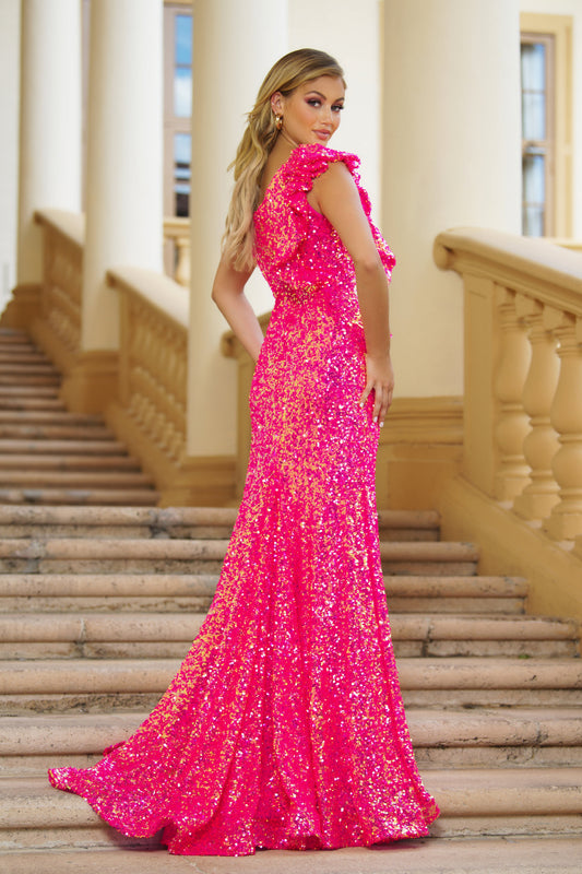 Ava Presley's 39280 Prom Dress is sure to make a stunning statement. Crafted from iridescent sequins, this one-shoulder gown features a ruffle-trimmed neckline, and a dramatic side slit. Perfect for prom, pageants, and other special occasions. Sizes: 00-24 Colors: Iridescent Hot Pink, Iridescent Teal, Iridescent Light blue