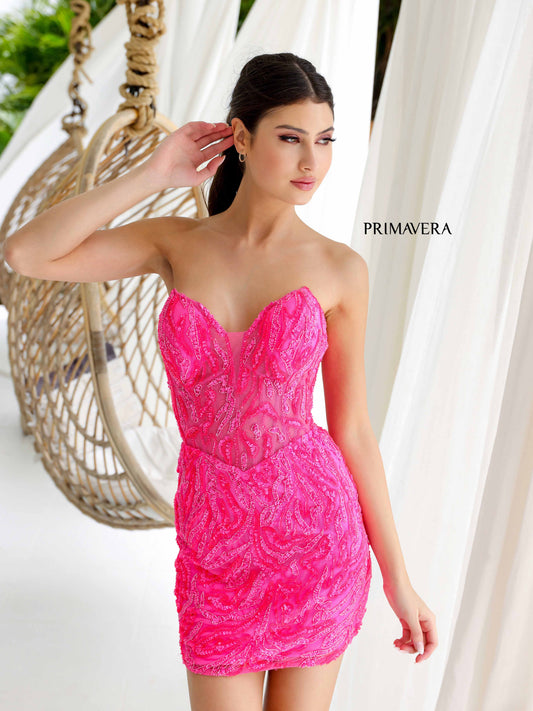 Look stunning in the Primavera Couture 4222 Short Homecoming Dress! This sheer sequin corset cocktail dress is beaded & sequin embellished to perfection, making you the life of any formal gathering. Get ready to sparkle and shine in this unique and playful gown.