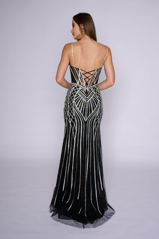Experience elegance and sophistication in the Nina Canacci 4428 prom dress. This stunning evening gown features a sheer corset bodice with crystal detailing and a fitted silhouette for a flattering look. The V-neckline adds a touch of glamour to this formal dress. Elevate your wardrobe with this timeless piece.
Sizes: 0-14
Colors: Black, Gold/Silver, Blue/Silver