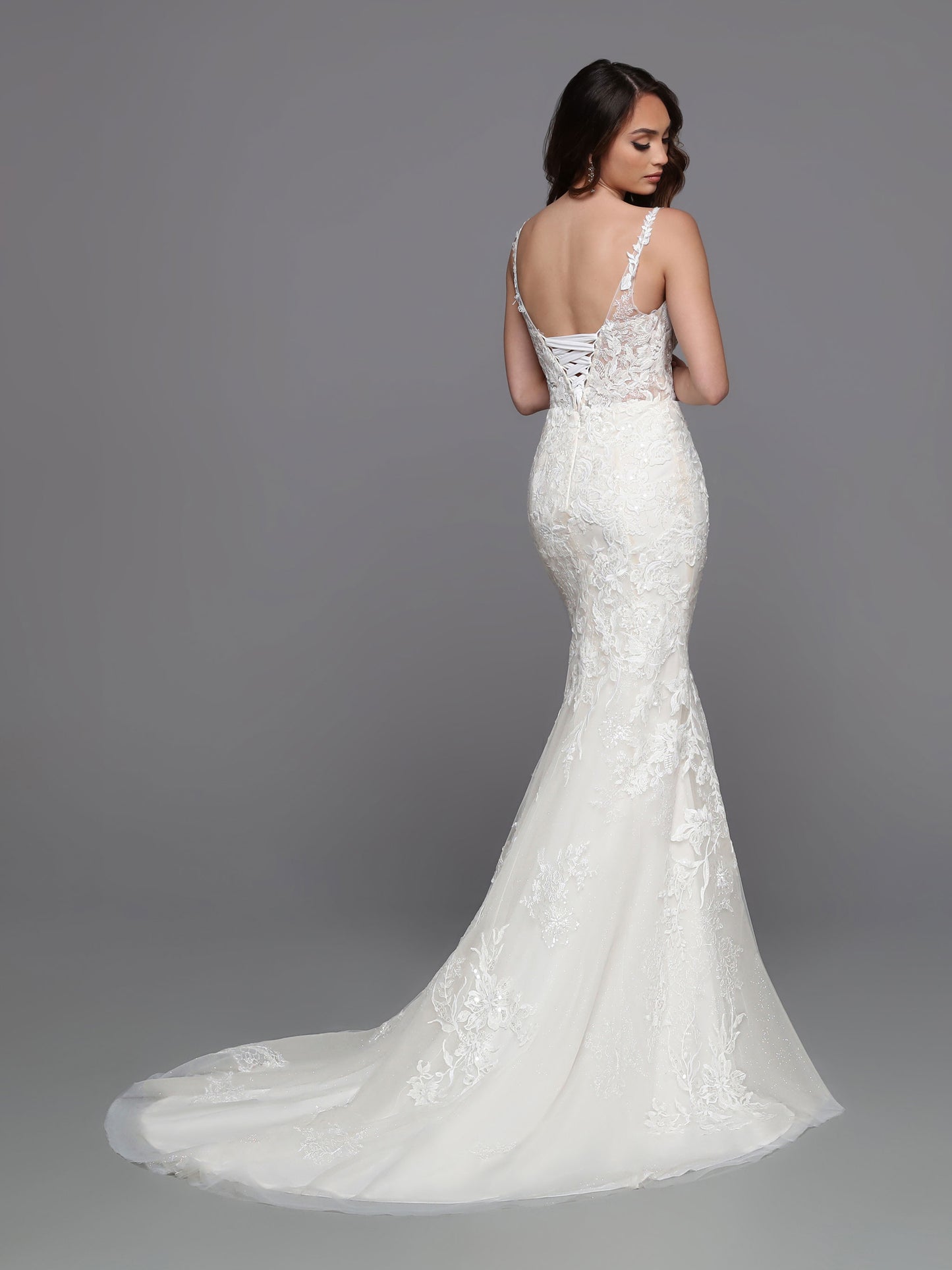 Featuring sheer beaded lace and a wide ribbon corset, Davinci Bridal 50738 is the perfect fit & flare sheath wedding dress. Create your dreamy walk down the aisle with the detachable skirt and extended tulle train. Accentuate your figure and showcase your sense of style with this elegant option.