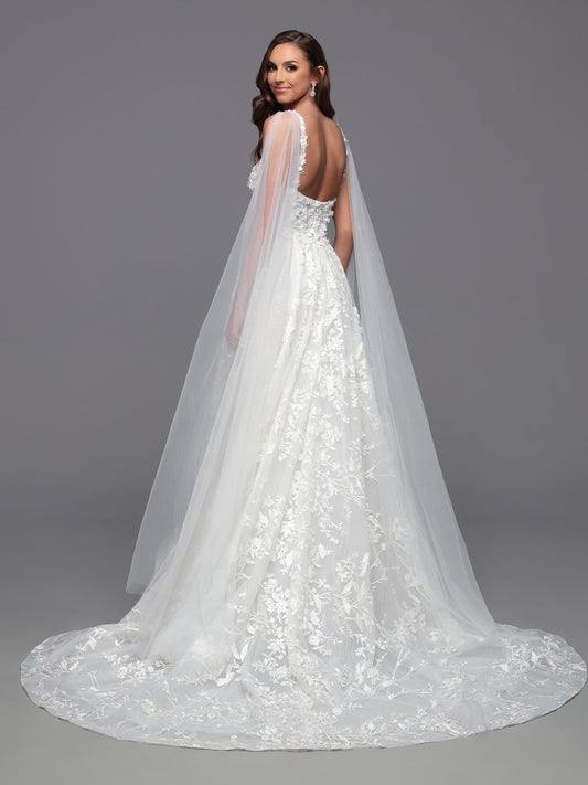 Look stunning on your special day in this Davinci Bridal 50806 A Line Lace Cape Wedding Dress. Constructed with a sheer crystal plunging neckline and 3D floral embroidery on the front and back bodice, this gown provides an exquisite look with gathered skirt and chapel train. Plus, you can customize your look and stand out in photos with the addition of the detachable veil wings. Sizes: 2-20 Colors: Ivory
