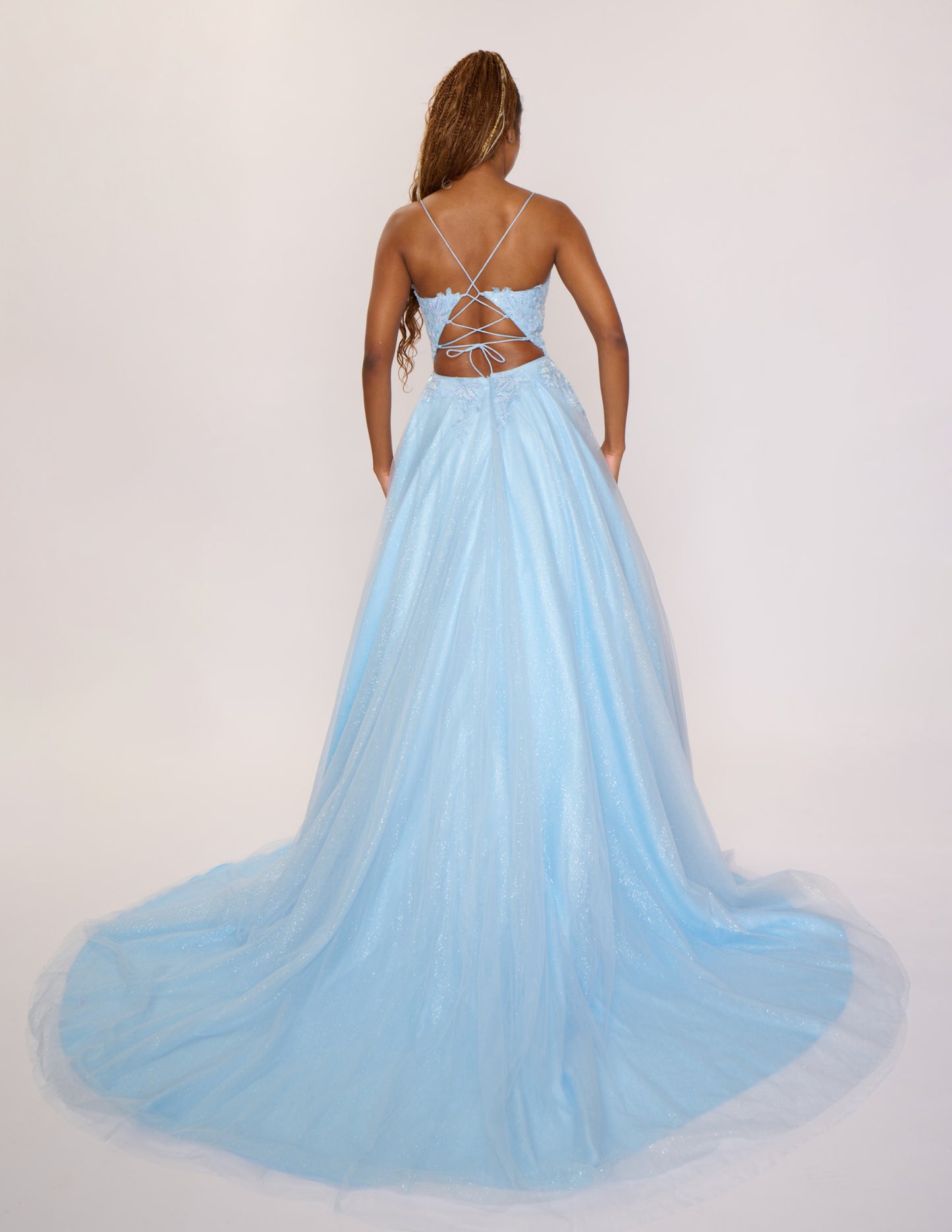 Expertly crafted by Nina Canacci, the 6624 Long A Line dress features a flattering corset bodice and a stunning backless design. The elegant train and A-line silhouette make it the perfect choice for prom, pageants, or any formal event. Elevate your style with this timeless and beautifully designed gown.
Sizes: 4-14
Colors: Black, Red, Light Blue