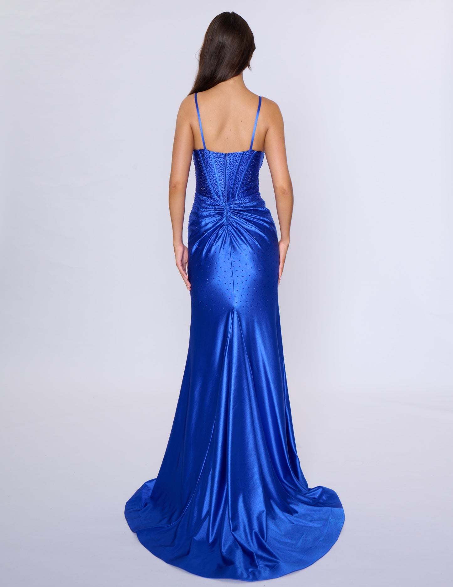 Experience elegance and glamour with our Nina Canacci 6687 long fitted prom dress. Featuring a crystal corset and a V-neck with a tasteful slit, this dress is perfect for formal evening events. Its figure-hugging fit and intricate details will make you stand out and feel confident all night long.
Sizes: 0-16
Colors: Red, Royal, Black, Blue