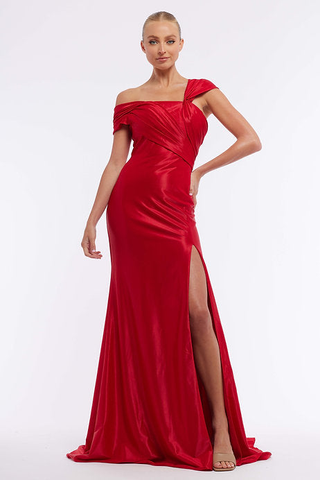 Make a statement at your next formal event with the Vienna Prom 7965 dress. This stunning gown features a fitted silhouette, one shoulder design, and ruching for a flattering look. The high slit adds a touch of drama to this elegant pageant gown, perfect for standing out in the crowd.