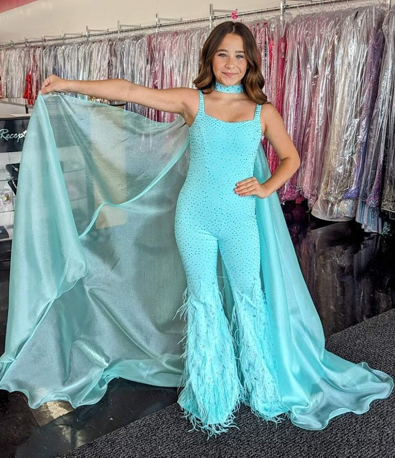 Ashley Lauren Kids 8210 Long Girls Pageant Jumpsuit with Crystal embellishements and a scoop neckline. Feather Embellished flared Bell Bottoms with a choker embellished with crystals and organza Cape. Sizes: 4-16 Colors: Aqua, Fuchsia