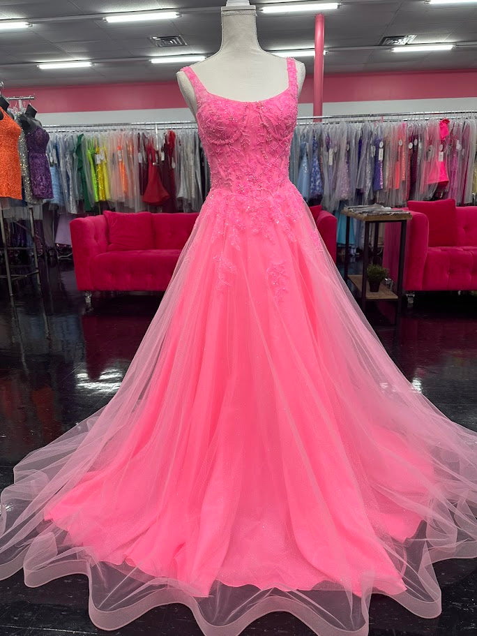 Elevate your evening with the Nina Canacci 8266 ballgown, designed in a vibrant hot pink hue. This size 4 dress features intricate beading that adds a subtle shimmer, enhancing its elegant A-line silhouette. The corset bodice offers a flattering fit, while the scoop neckline and backless design create a graceful, sophisticated look perfect for prom or formal occasions.
Size: 4
Color: Hot Pink