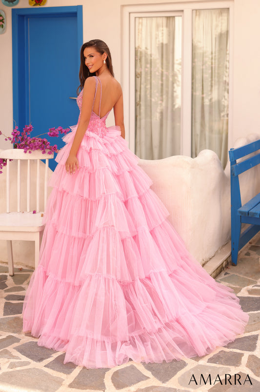 Introducing the Amarra 88147 Beaded One Shoulder Pageant Dress. With intricate beading and a tiered overskirt, this formal gown exudes elegance and sophistication. The crystal detailing adds a touch of sparkle, making you stand out at any event. Elegant tiered tulle gown with intricate crystals and sequin, and a flattering one shoulder neckline. Elevate your style with Amarra. This elegant gown features a voluminous tiered tulle skirt that cascades gracefully to the floor, creating a dreamy, romantic s