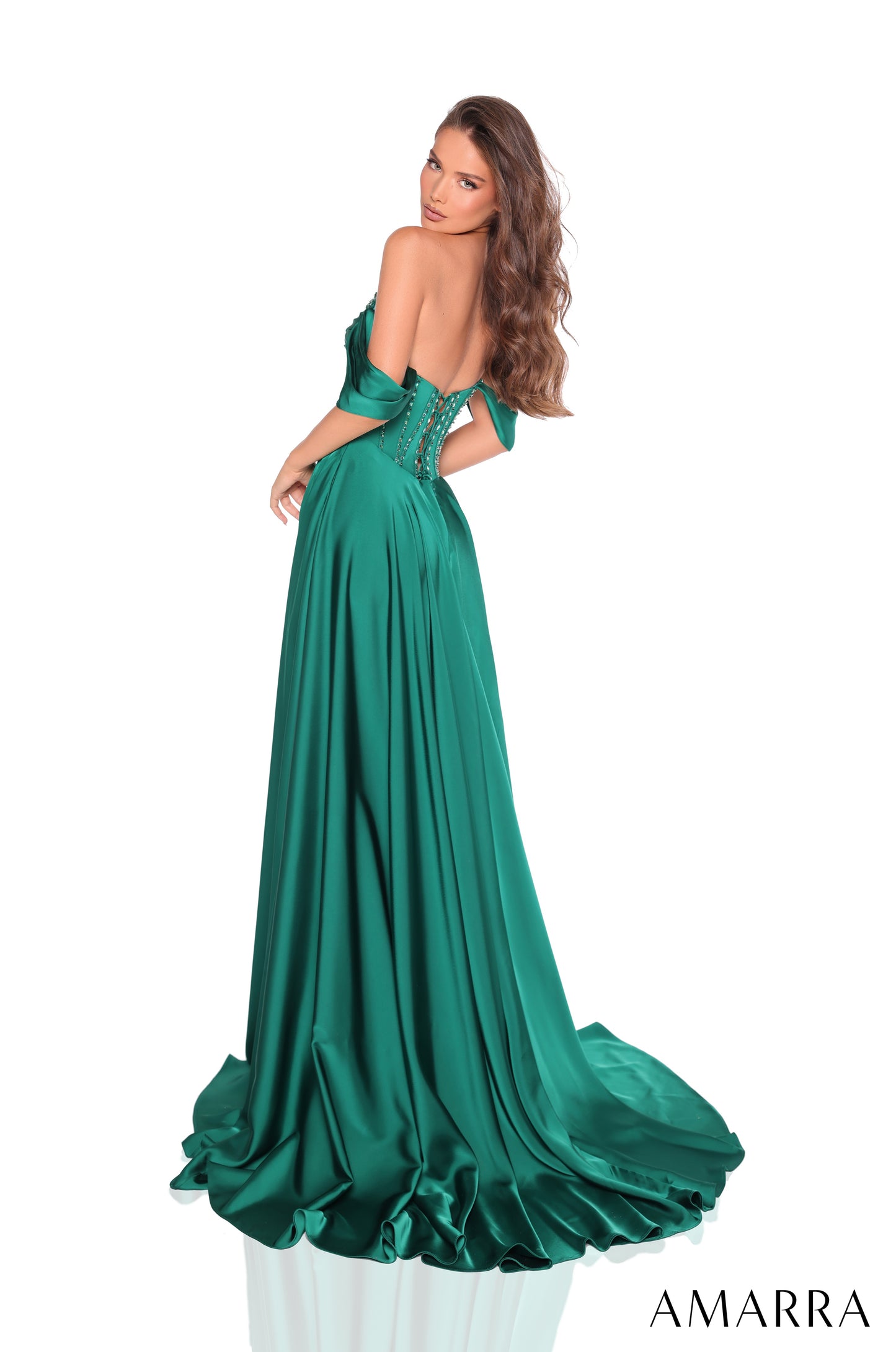 Be the center of attention in our Amarra 88367 satin A-line corset slit prom dress. This elegant off-the-shoulder gown with a V-neck will make you stand out at any formal evening event. The delicate corset detail and thigh-high slit add a touch of sophistication and sexiness. Expertly designed for a flawless fit. This stunning floor-length gown is a vision of elegance and sophistication, perfect for making a grand entrance at any formal event. The A-line silhouette gracefully flows from a fitted bodice to a