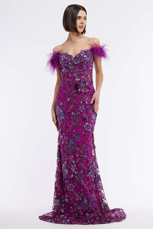 This exquisite Vienna Prom 8867 dress features a long sheer sequin corset for a modern, sophisticated look. This off the shoulder feather formal gown is embellished with intricate beading and sequins, giving it a glamorous feel perfect for a pageant or other special event. A timelessly elegant option for any wardrobe. Sizes: 00-16 Colors: Blue, Green, Pink, Purple