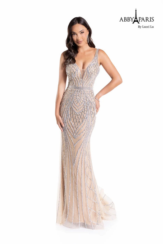 The Abby Paris 90156 prom dress is a standout piece for any special event. This fit and flare silhouette showcases a plunging neckline and beautiful embroidery with an elegant tulle overlay. Show up in style at your next event with this stunning long dress.