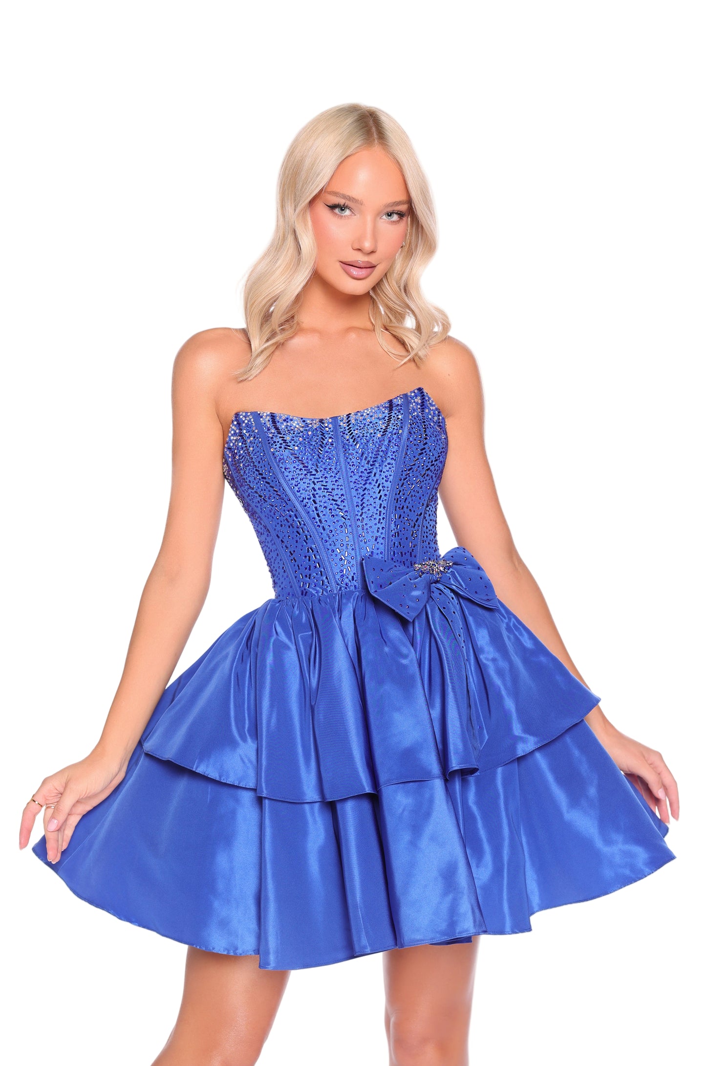 Elevate your evening with the Amarra 88912 Short Flared Crystal Corset Dress. Featuring a delicate scoop neckline and a crystal-embellished corset, this homecoming dress combines elegance with a flattering short, flared silhouette. The stylish bow accent on the hip adds a refined touch, making it perfect for cocktail parties and formal occasions. Designed to highlight your figure while offering comfort, this dress ensures you stand out with timeless sophistication. Turn up the charm in this tiered short dre