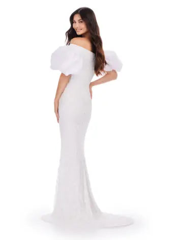 Make a statement with the Ashley Lauren 11432 long evening dress. Sparkling beads cover this off shoulder gown, featuring puff sleeves for a touch of drama. Perfect for formal events and pageants. Expertly crafted with quality materials for a luxurious feel. This fully beaded gown features taffeta puff sleeves that add the perfect amount of glam. The intricate bead pattern brings the entire look together.