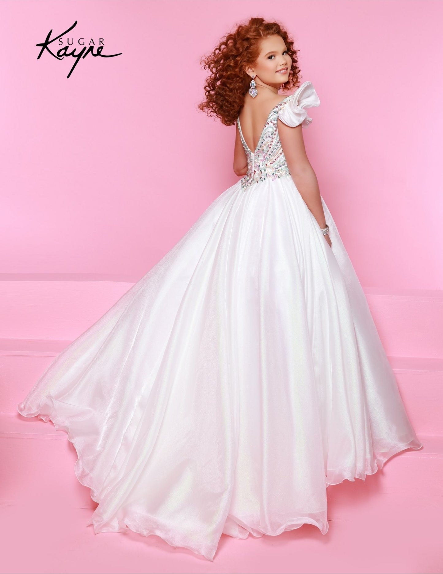 Bring out her inner beauty with this Sugar Kayne C334 Girls Pageant Dress. This luxurious dress is made from iridescent organza and features a sweetheart neckline and long ball gown skirt. Perfect for any special occasion. Transform into a twinkling starlet with this Metallic Organza Gown. The beaded bodice adds a touch of sparkle to this enchanting ensemble. The delicate ruffle sleeves create a charming look!
Color: Hot Pink Multi, Mint Multi, White Multi, Purple Multi
Size: 2, 4, 6, 8, 10