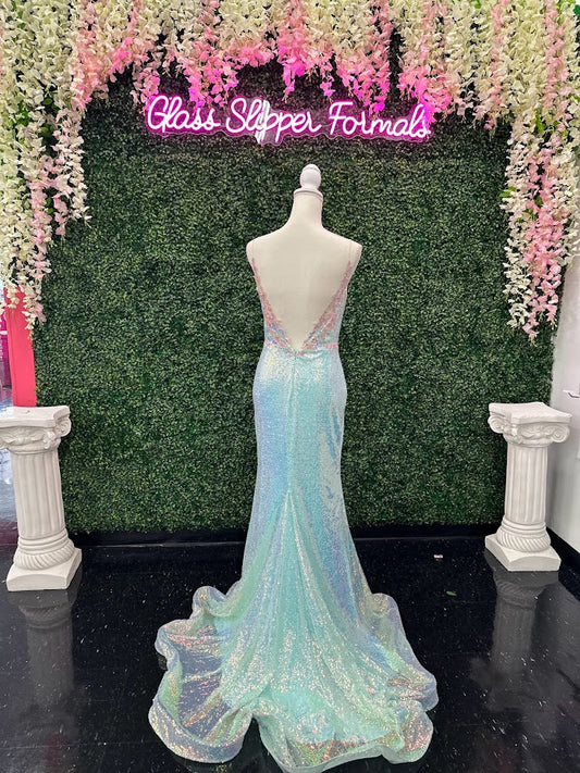 Look like a star in this Johnathan Kayne 2266 Size 4 Iridescent Blue Sequin Custom Pageant Dress Prom Gown. Delicate sequins shimmer in the light, while an elegant ball gown silhouette ensures you look your best. Perfect for formal occasions or pageants. Lush train with sequin floral details and slit. *ONE OF A KIND Size: 4 Color: Iridescent Blue