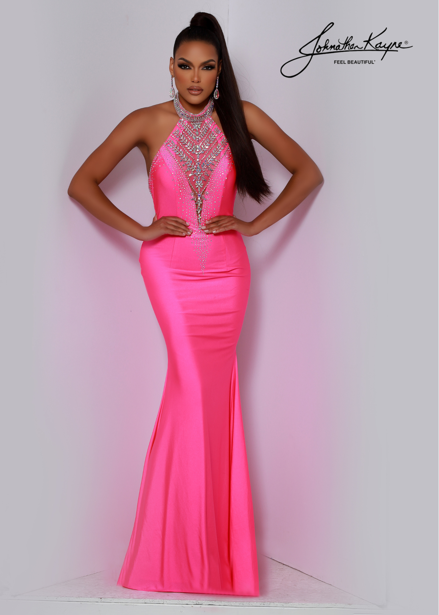 The Johnathan Kayne 2670 Long Prom Dress is the perfect formal gown for your next event. Featuring a lush mermaid silhouette and hand-beaded halter neckline and open back, this designer piece offers an eye-catching look without compromising on comfort and elegance. Sophistication at its finest! This jaw-dropping high-neck halter in 4 way stretch lycra has a hand beaded neckline which is sensational for any special event.