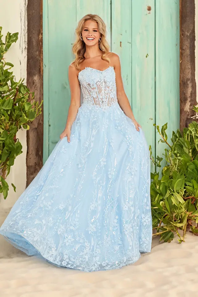 Step into elegance with our JVN12254 Sky Blue prom dress. This stunning A-line gown features a strapless lace sweetheart neckline and a sheer corset bodice, creating a flattering and feminine silhouette. Perfect for any special occasion, this dress exudes sophistication and grace.