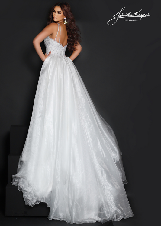 Look elegant with this Johnathan Kayne 2618 pageant dress. The high neck and sweeping long skirt are adorned with sequin lace and crystal detailing, perfect for any special occasion. Make a lasting impression. This style is sure to be a knockout at your next pageant! Walk across stage with confidence in this halter neck beaded stretch lace fitted gown with organza overskirt. Colors: Barbie Pink, Royal, Red, White Sizes: 00-22