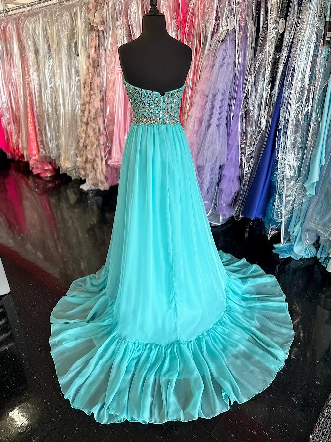 Elevate your evening with the Johnathan Kayne 2612, a size 4 aqua long A-line gown that exudes elegance. This strapless prom dress features shimmering sequins and delicate ruffle details, creating a graceful silhouette perfect for pageants or formal events. Its refined design combines classic charm with modern sparkle, ensuring you stand out with sophistication and poise.
Size: 4
Colors: Aqua