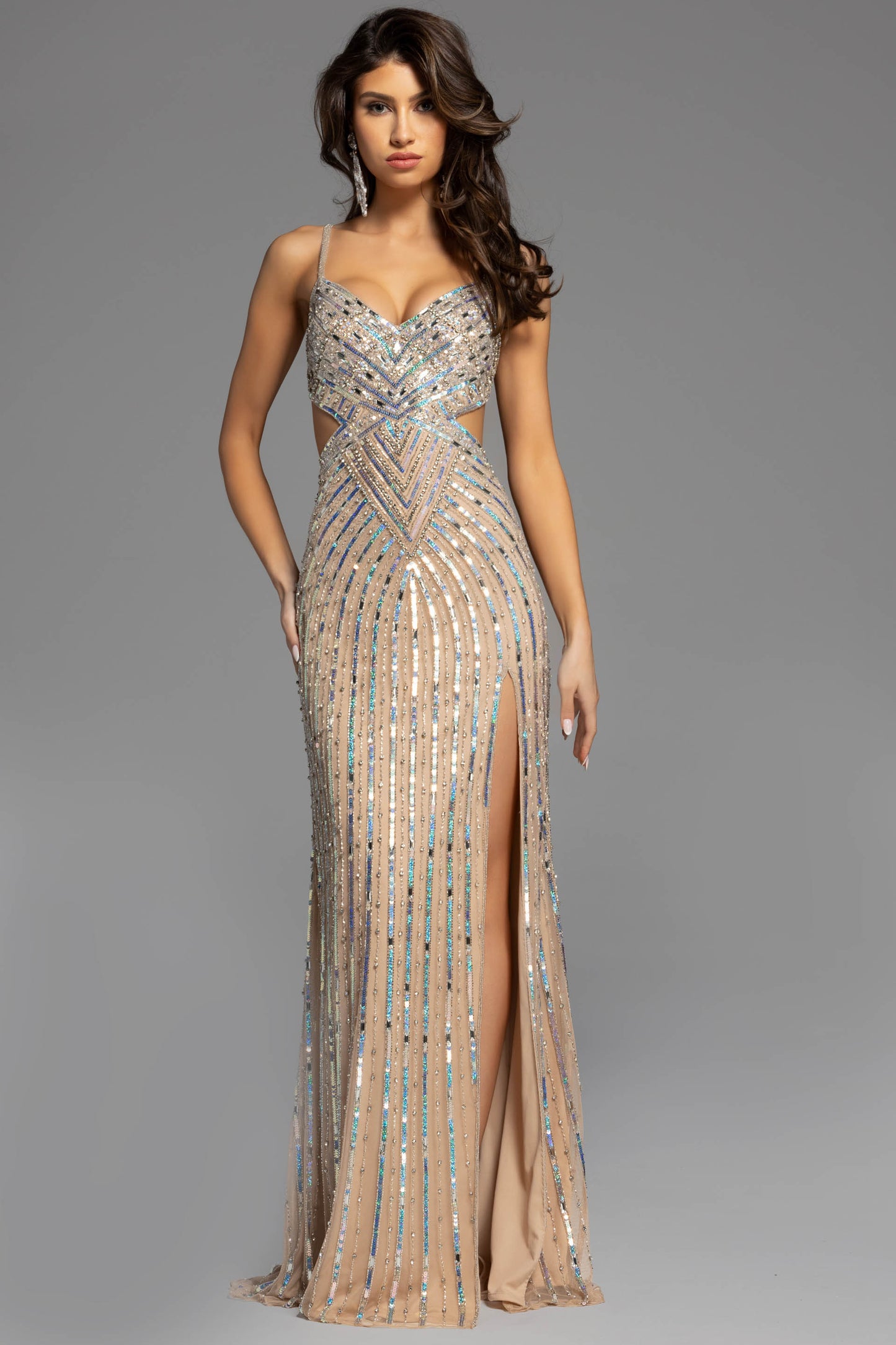 Get ready to turn heads in this stunning top selling Jovani 40060 dress! The form-fitting silhouette and intricate sequin detailing make for a glamorous look, while the cut-out design adds a touch of edge. Perfect for prom or any formal event, this gown is sure to make a statement.
Size: 00-24
Color: Nude, Blue, Purple, Royal