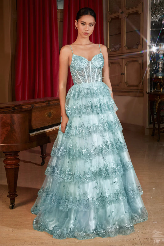 This Ladivine KV1108 Prom Dress features a sheer sequin corset, A-line cut, and ruffle detailing, creating a stunning and elegant silhouette. The layered tulle skirt adds volume and drama, making it the perfect option for formal events and balls. Step into enchantment with this sultry A-line ball gown—a bewitching fusion of glamour and allure. The layered tiered scalloped sequin ruffled skirt creates a mesmerizing play of light, ensuring every step is a symphony of elegance.