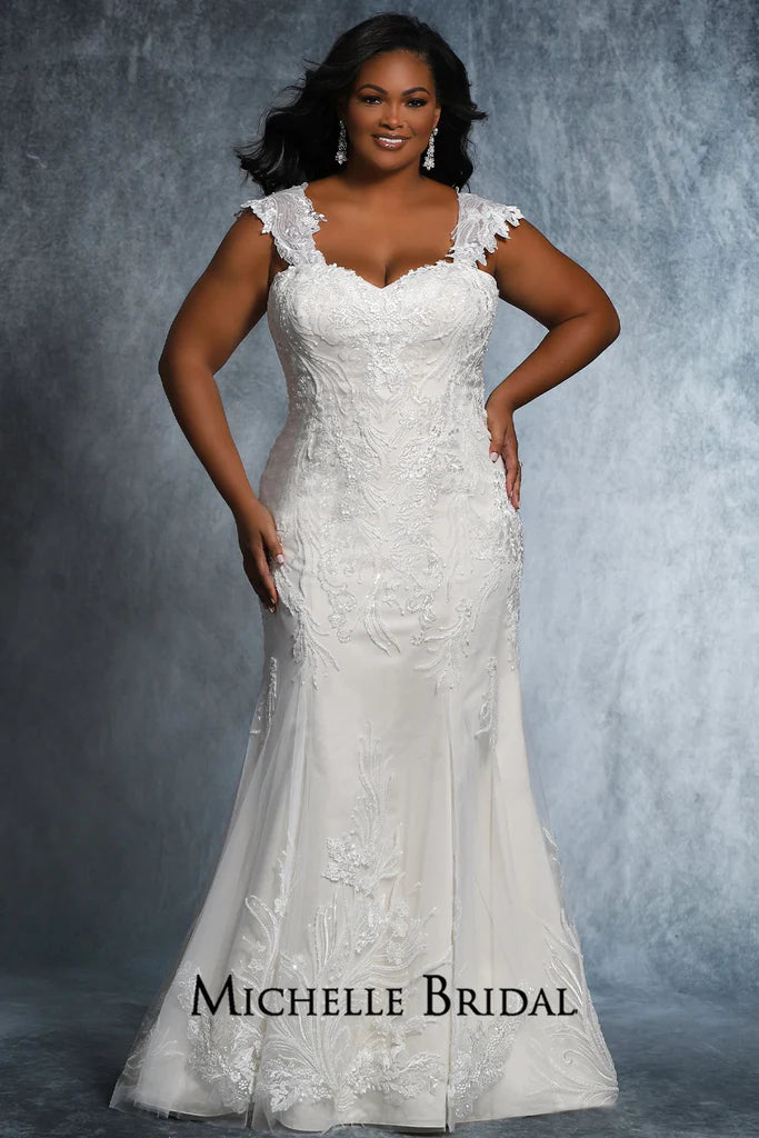 The Michelle Bridal for Sydney's Closet MB2117 is a stunning plus-size bridal gown featuring a strapless sweetheart neckline, lace-up back, and fitted silhouette adorned with floral appliques and pearls. Made with sequins for added sparkle, this striking gown will be sure to make any bride's special daydream come true.