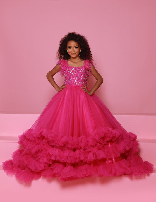 Sugar Kayne C327 features a fashionable pageant dress for girls and preteens, complete with feather straps, a tiered ruffle bottom, and a crystal stone bodice. Stand out and feel confident on stage! This tulle ballgown features ostrich feathers on the shoulders, a beaded bodice, and tiered skirt to show off your personality!
Colors: Aqua, Bubblegum, White, Magenta
Sizes: 2, 4, 6, 8, 10, 12, 14, 16
(Sizes 2-6 do not have bust cups, Sizes 8-16 will have preteen size bust cups)