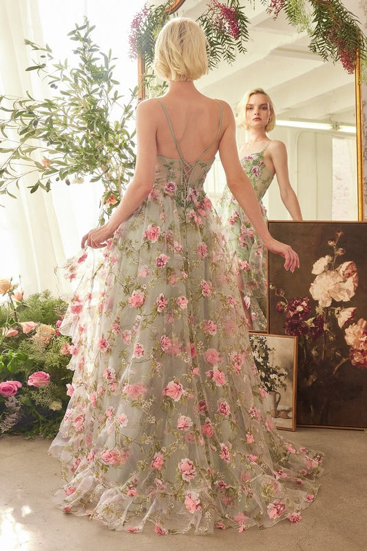 This stunning Andrea & Leo Couture A1420 dress features a beautiful ruffle A-line design with a sheer corset top for a flattering silhouette. The layered floral print adds a touch of elegance to this prom dress. Feel confident and chic in this must-have gown. This enchanting A-line gown features a sweetheart neckline, delicate thin straps, and a sheer structured bodice adorned with floral prints. Crafted from layered organza, the ruffle skirt cascades gracefully, creating a romantic and flowy silhouette