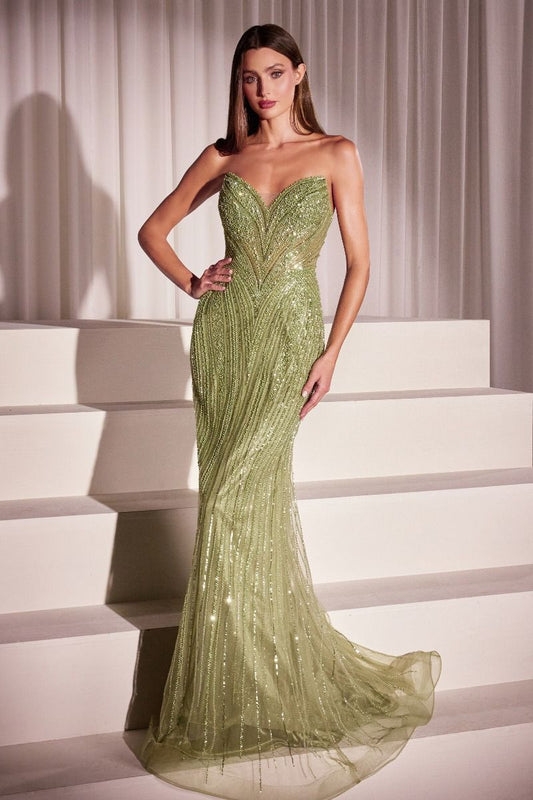 Elevate your formal entrance in this stunning Ladivine CC416 strapless sequin corset gown. Crafted with intricate sequin detailing and a structured corset bodice, this dress commands attention with its dramatic train and elegant V-neckline. Perfect for prom, pageants, or black-tie galas, the fitted silhouette flatters your figure while the flowing train creates a show-stopping finish. A timeless choice for those seeking luxury and sophistication on their most memorable nights.
Silhouette: Fitted
Desig