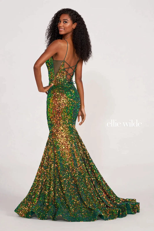 Look sophisticated and graceful in Ellie Wilde EW34016. The signature Iridescent color shifting sequins and mermaid silhouette make this timeless corset dress a perfect choice for a formal occasion. Captivate everyone in the room with its sparkling iridescent material and backless v-neckline. Sizes: 16 Colors: FOREST LIGHT https://dy9ihb9itgy3g.cloudfront.net/static/themes/EllieWilde/Spring_2023/EW34016.mp4