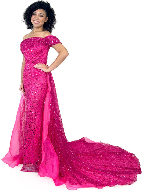 This Marc Defang 8228 dress is an elegant, fitted off-the-shoulder design, featuring a detachable overskirt and ornate pearl, sequin, and beaded detailing. It's perfect for a unique prom, pageant, or wedding look. Corset back Sizes: 00-16 Colors: Hot Pink, White *Allow 30 days production