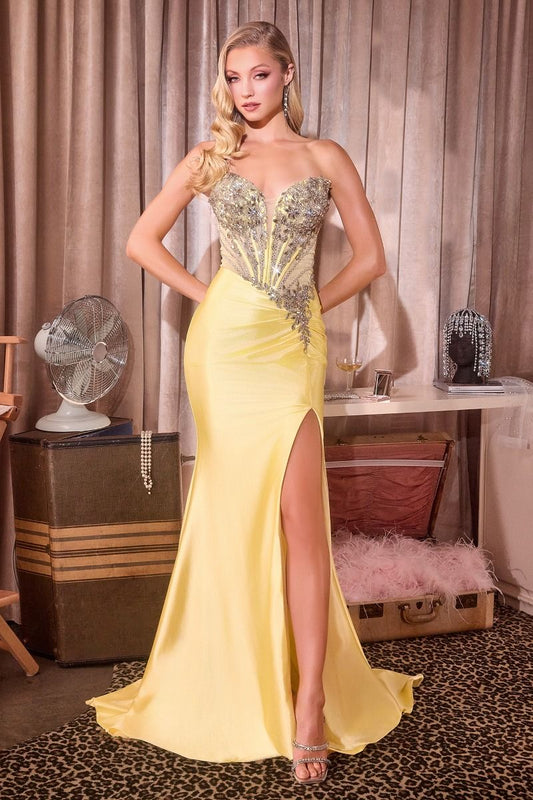 Elevate your prom night with the Ladivine KV1144, a stunning off-the-shoulder gown designed to turn heads. This sophisticated dress features intricate beading throughout the corset bodice, creating a glamorous silhouette that flatters and supports. The dramatic slit train adds movement and elegance, while the backless design offers a daring, modern touch. Perfect for those seeking a show-stopping formal look that balances classic prom style with contemporary edge. Available in select sizes and colors.
Silh