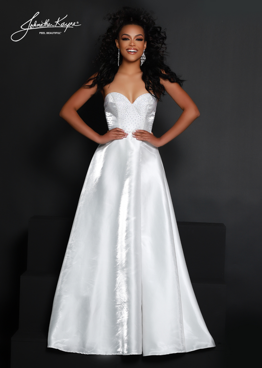 Make a statement in this Johnathan Kayne 2642 dress! Made of luxurious White Shimmer satin, its A-line silhouette and puff sleeves will have you looking fabulous for any formal occasion. With a high slit for extra pizzazz, you won't be able to resist this elegant maxi dress! Shake things up in style! Show off your style and sophistication in this beautiful shimmer satin A-line gown with removeable puff sleeves at any event Size: 2 Color: White