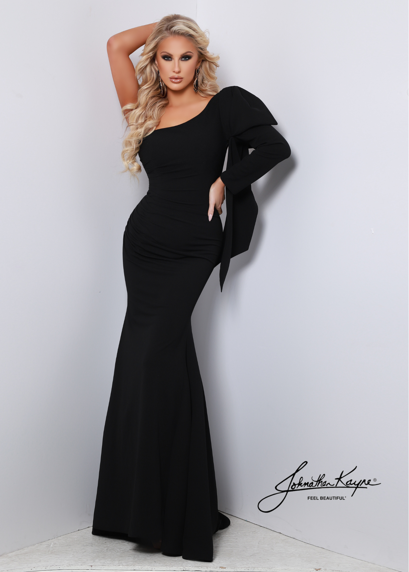 Be the belle of the ball in this gorgeous Johnathan Kayne one-shoulder dress! The luscious long crepe gently cascades to the floor, while the detachable bow adds an ultra-flattering look. Get that perfect mix of elegant and modern - this is the showstopper you need! Size 4 Color: Mint