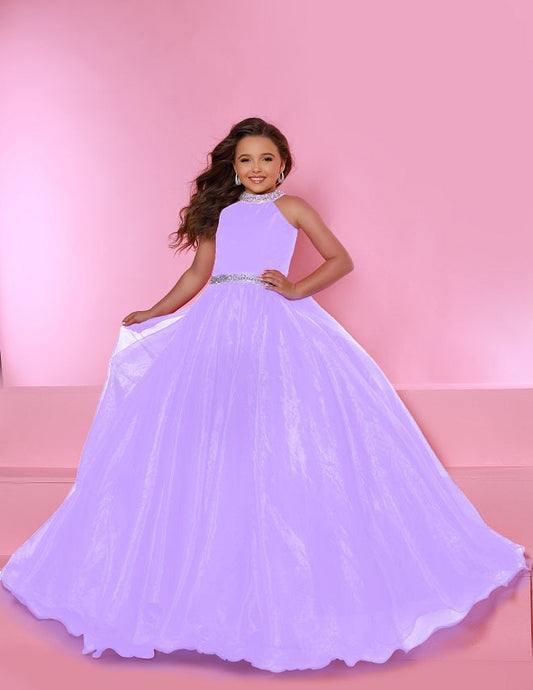 Sugar Kayne C114 by Johnathan Kayne is an Organza Girls Ball Gown Pageant Dress. Featuring a high neckline with crystal rhinestone accents. The waist line is broken with a crystal bling belt. The lush Ball gown skirt features a horse hair trim. Glide across the stage in the classic beauty!
Available Colors: Aqua, Barbie Pink, Jade, Lilac, Neon Orange, Royal, Ruby Red, White, Yellow
Available Size: 2-16
(Sizes 2-6 do not have bust cups, Sizes 8-16 will have preteen size bust cups)