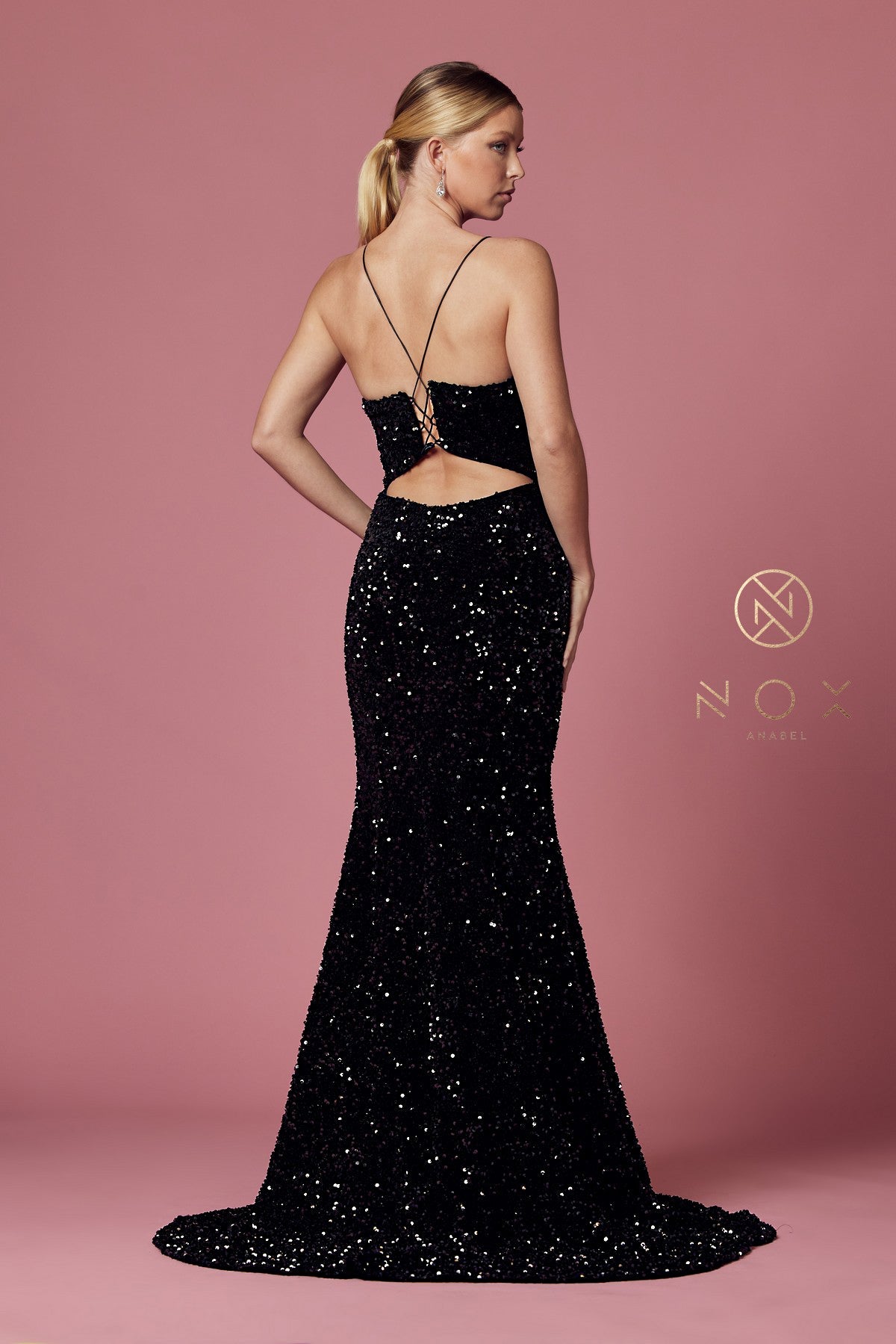 Nox Anabel R433 Long Fitted Velvet Sequin Prom Dress Formal Slit V Neck Corset PLUNGING NECKLINE FITTED BODICE VELVET SEQUENCE TRUMPET SKIRT An absolutely glamorous piece by NOX ANABEL is for a classy lady who is all about the details. This relaxed fit-and-flare silhouette features a soft sweetheart plunge neckline and spaghetti straps for an elegant and universally flattering shape—Shinny silhouette with sequins incorporated throughout the sheer bodice for a hint of shimmer.