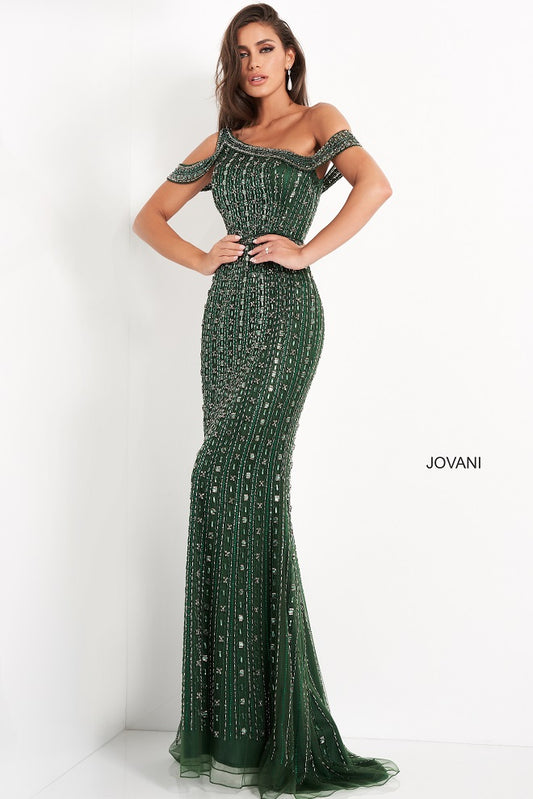 Jovani 03124 Emerald green evening gown features a fitted silhouette with an asymmetrical one-shoulder neckline and band style sleeves. It features horizontal beading down the floor length of the gown. Formal Evening Wear Gown, Pageant Gown