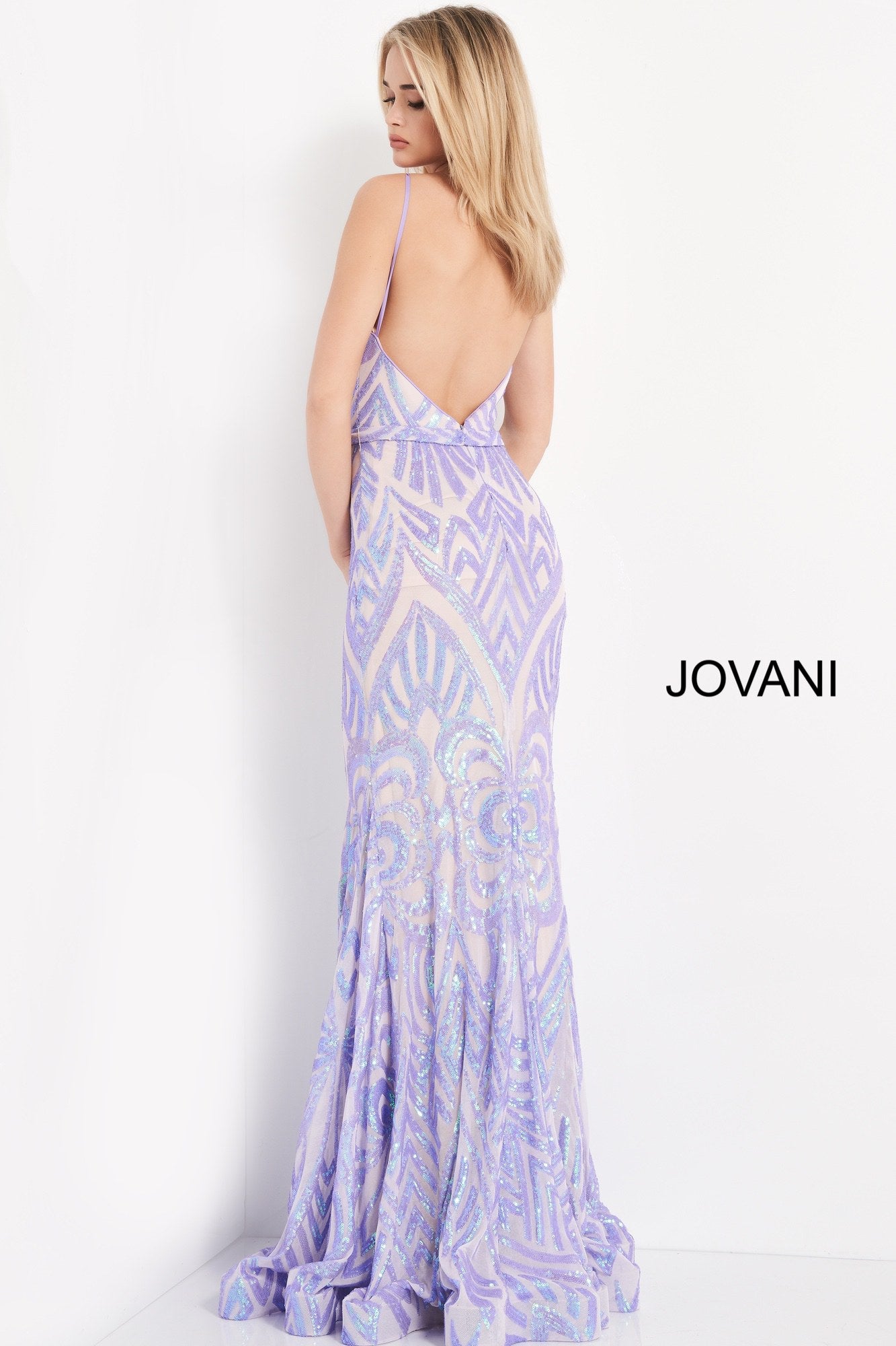 Jovani 03446 This is a long fit and flare prom dress with a high neckline and backless design. It has a beaded sequins pattern throughout. Lilac Size 12