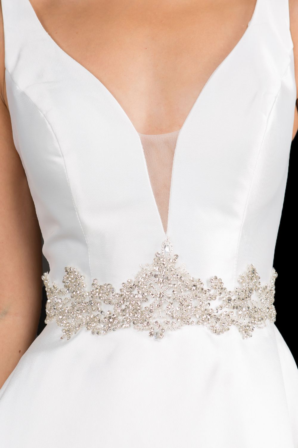 Nina Canacci 2297 plunging neckline A line prom dress formal evening gown with an embellished waistline. Perfect for a wedding dress in Ivory. Color: Ivory, Emerald, Royal Sizes: 8,10,12,14,16, 18, 20, 22, 24
